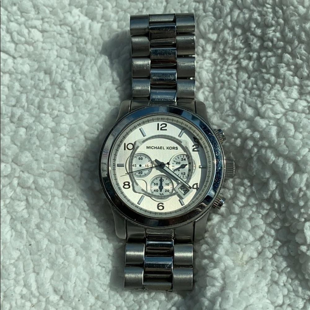 Silver men’s Michael Kors watch
